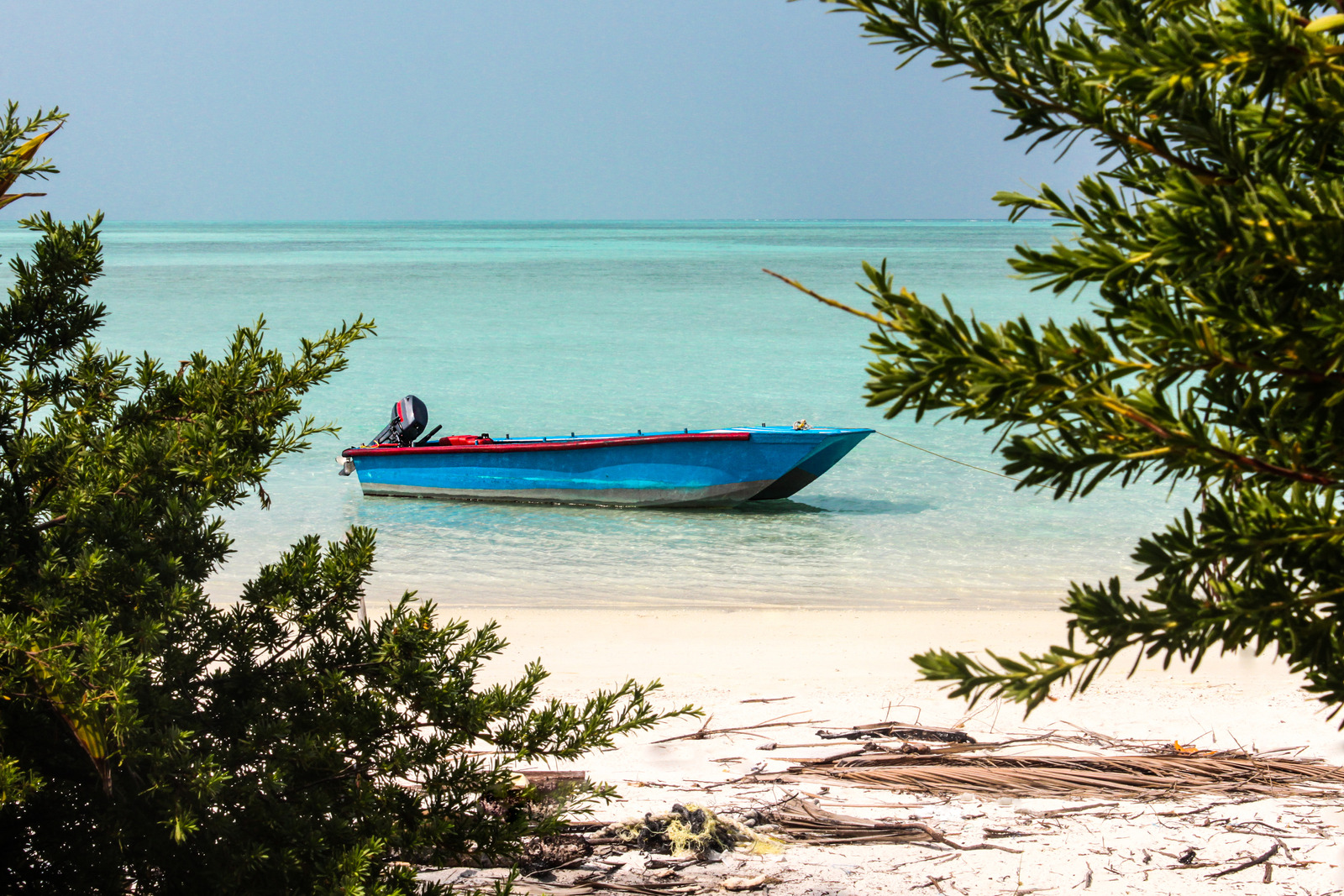 Parked boat ona deserted island in Lakshadweep